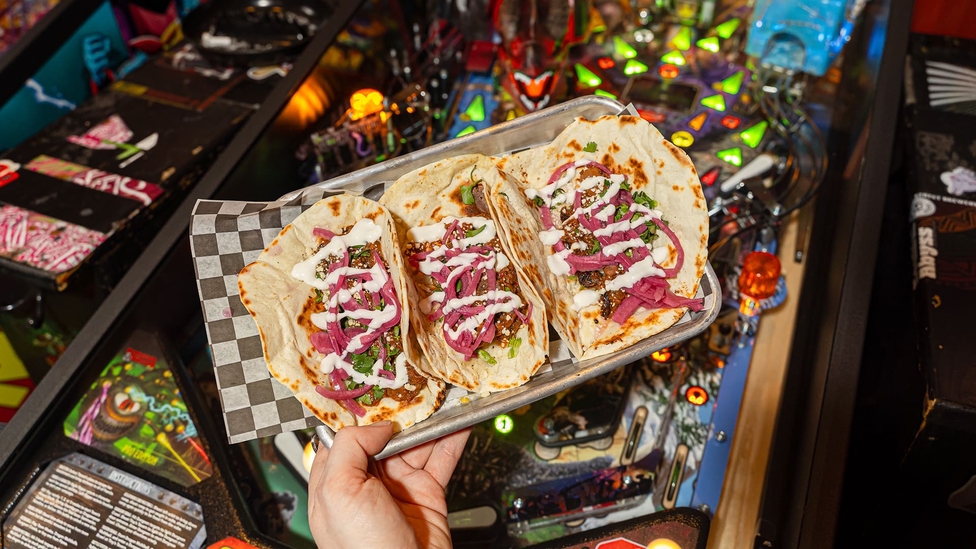 A tray of three tacos