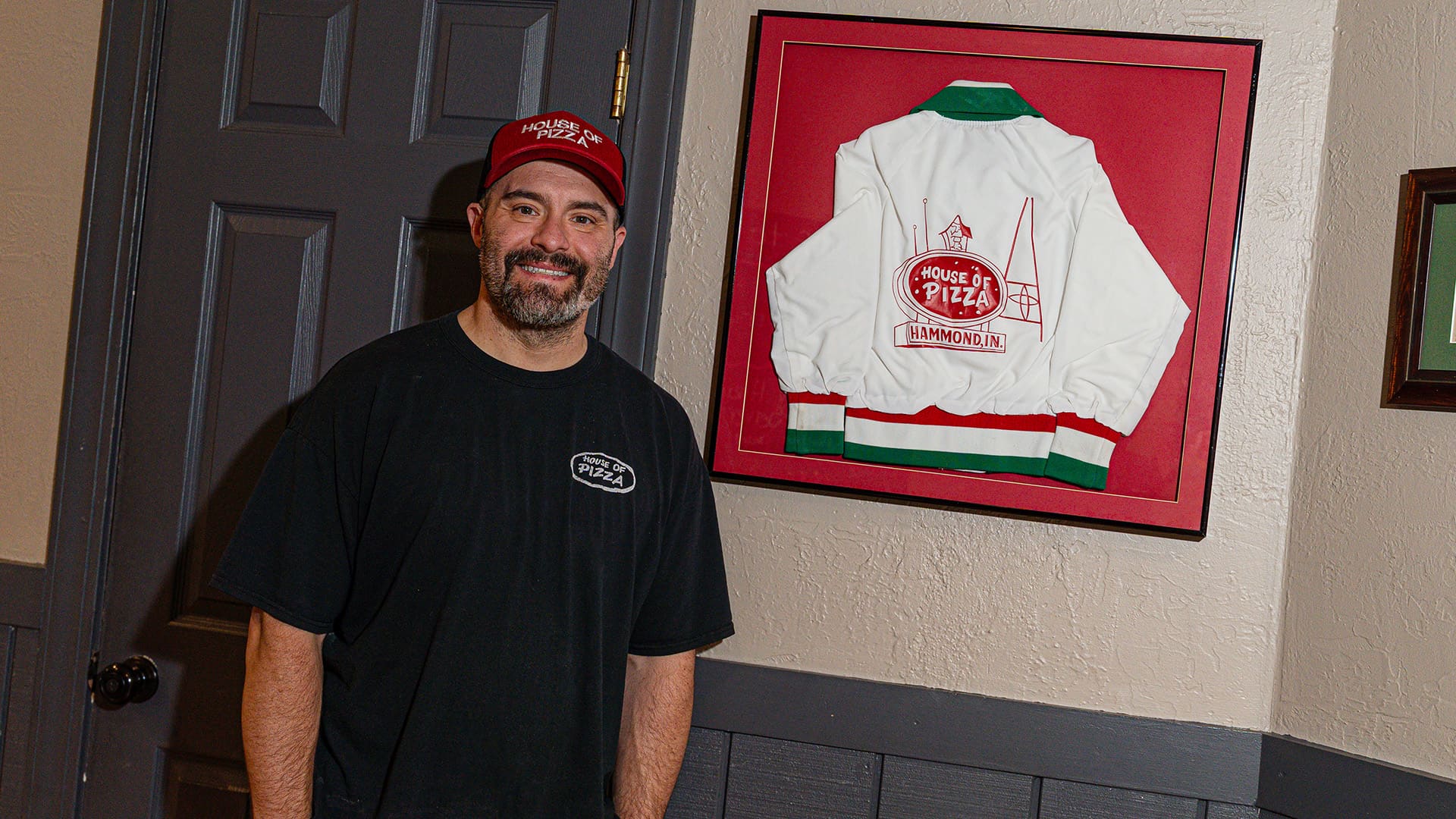 Danny Zunica, pictured with the House of Pizza jacket he wore as a kid