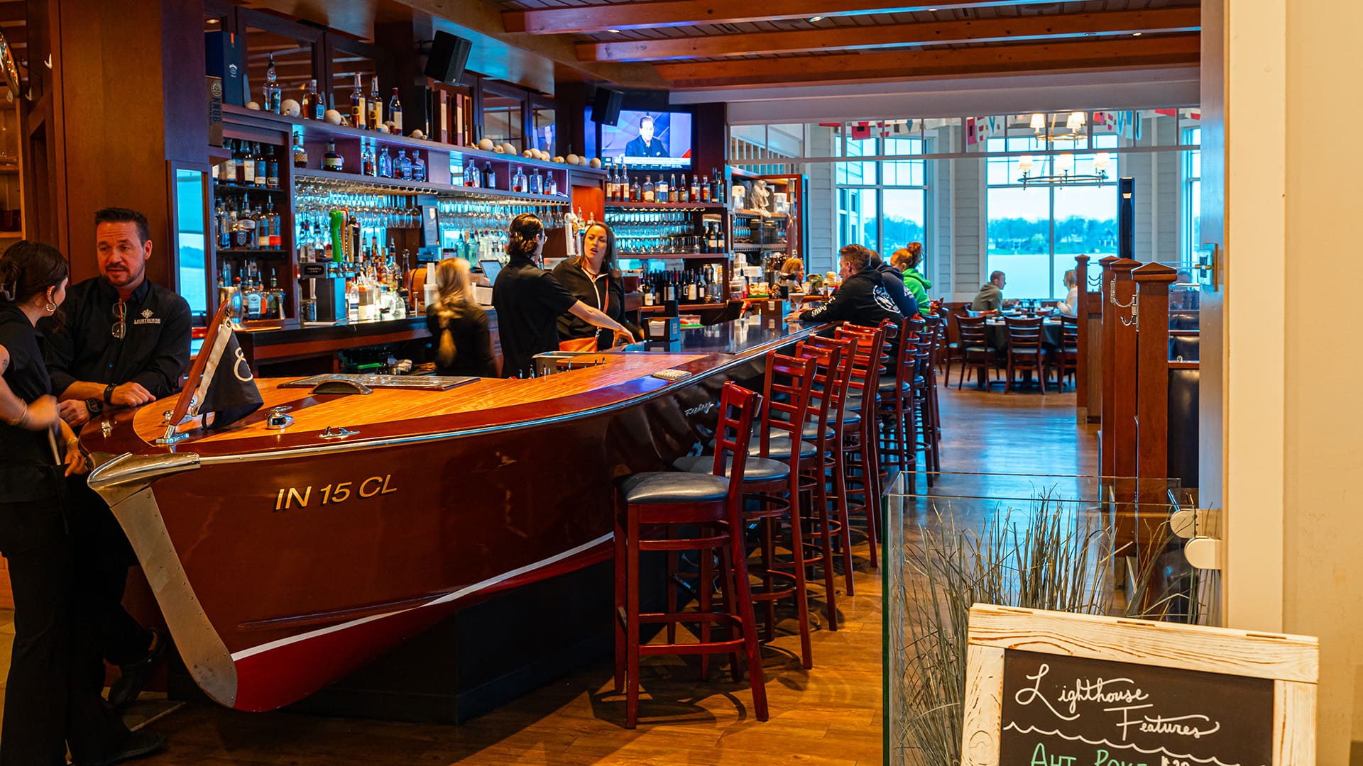 The bar, which is in the shape of a wooden boat, at the Lighthouse restaurant