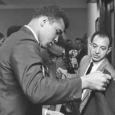 Muhammad Ali in a hearing with the Illinois Athletic Commission on February 25, 1966 over whether to cancel his fight against Ernie Terrell for Ali’s refusal to serve in the military. Photo: ST-50000293-0010, Chicago Sun-Times collection, Chicago History Museum