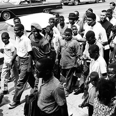 Muhammad Ali visits kids at the Saint Agatha Church, 3147 West Douglas Boulevard, Chicago, Illinois on July 1, 1966. Photo: ST-50000292-0001, Chicago Sun-Times collection, Chicago History Museum