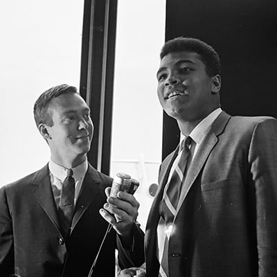 Muhammad Ali talks to the press as he arrives at O'Hare Airport, Chicago, Illinois on June 21, 1967. Photo: ST-50000290-0003, Chicago Sun-Times collection, Chicago History Museum