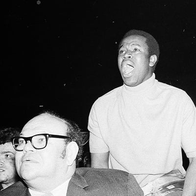 Fans watch the "Fight of the Century" boxing match between Muhammad Ali and Joe Frazier through closed circuit television at the Chicago Coliseum, 1513 South Wabash Avenue, Chicago, Illinois on March 8, 1971. Photo: ST-40000995-0025, Chicago Sun-Times collection, Chicago History Museum