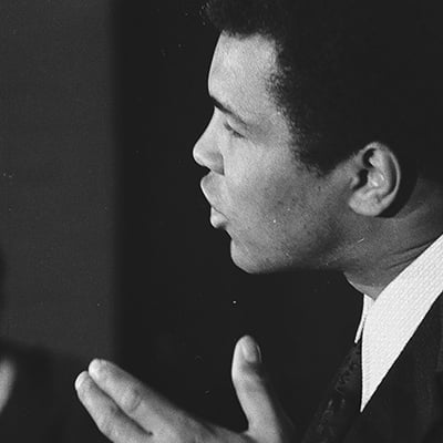 Muhammad Ali speaking about his upcoming heavyweight fight with Chuck Wepner at a press conference at the Regency Hyatt hotel, 151 East Wacker Drive. Chicago, Illinois, January 24, 1975. Photo: ST-19130562-0006, Chicago Sun-Times collection, Chicago History Museum
