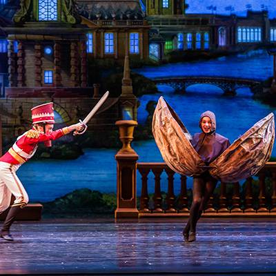 A soldier chases a walnut in the second act (Photo by Cheryl Mann)