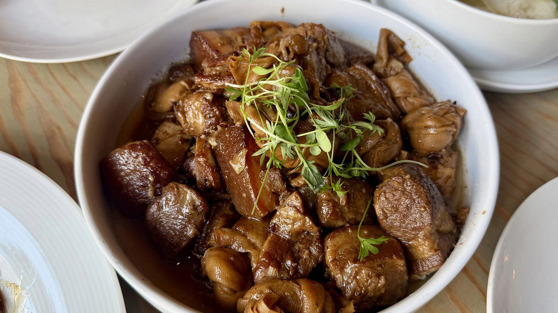 Glazed pork belly chunks in a bowl