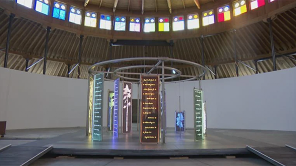 (WTTW News) Colorful panels arranged in a circle as part of a display at the DuSable Museum of African American History in Chicago.