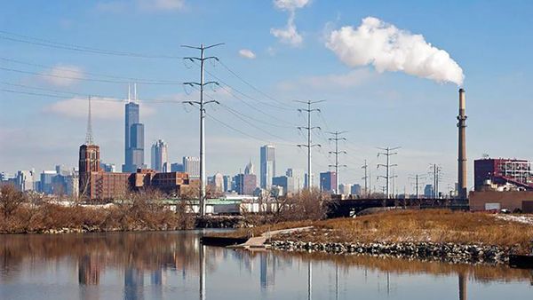 A view of the Chicago Skyline with a smokestack on the right. (Creative Commons / © 2013, Jeremy Atherton)