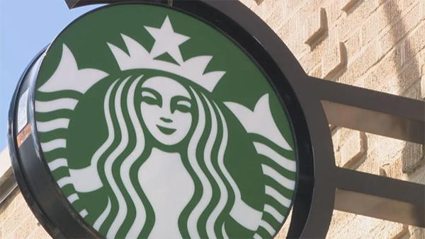 (WTTW News) Starbucks logo outside of a building
