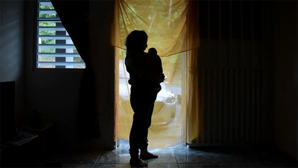 Michelle Flandez stands in her home with her two-month-old son Inti Perez, who is diagnosed with microcephaly linked to the mosquito-borne Zika virus, in Bayamon, Puerto Rico on Dec. 16, 2016. (AP Photo / Carlos Giusti, File) Michelle Flandez stands in her home with her two-month-old son Inti Perez, who is diagnosed with microcephaly linked to the mosquito-borne Zika virus, in Bayamon, Puerto Rico on Dec. 16, 2016. (AP Photo / Carlos Giusti, File)