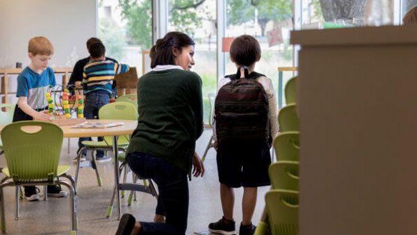 Child at new school. Child at new school.