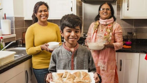 Family cooking together. Family cooking together.