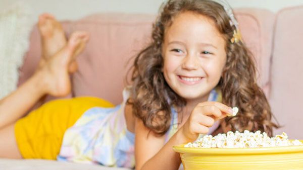 Child eating popcorn
