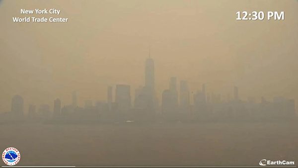 New York City's skyline seen through grey orange smoke on June 7, 2023
