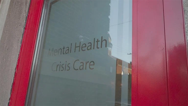 A door reading Mental Health Crisis Care