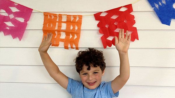 Child with Papel Picado