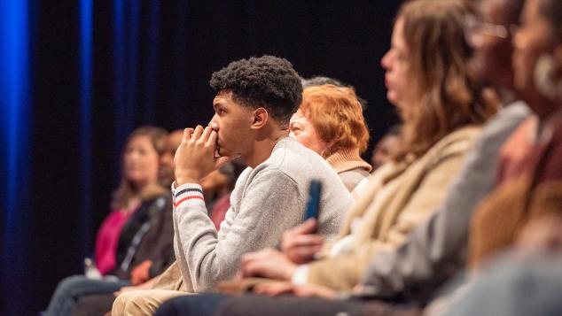 Studio audience listens intently to the offscreen speaker in WTTW's Grainger Studio 