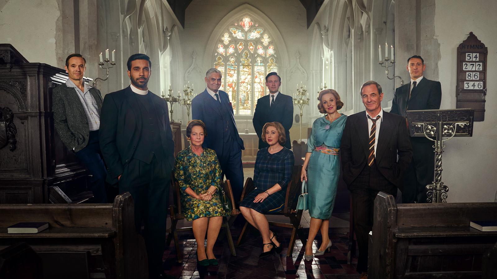 The cast of Grantchester (Daniel, Alphy, Mrs. C, Jack, Geordie, Cathy, Miss Scott, Leonard)  poses in a church