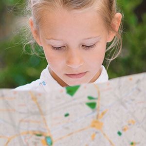 Girls looking at map.