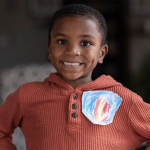 Little boy with his courage badge.