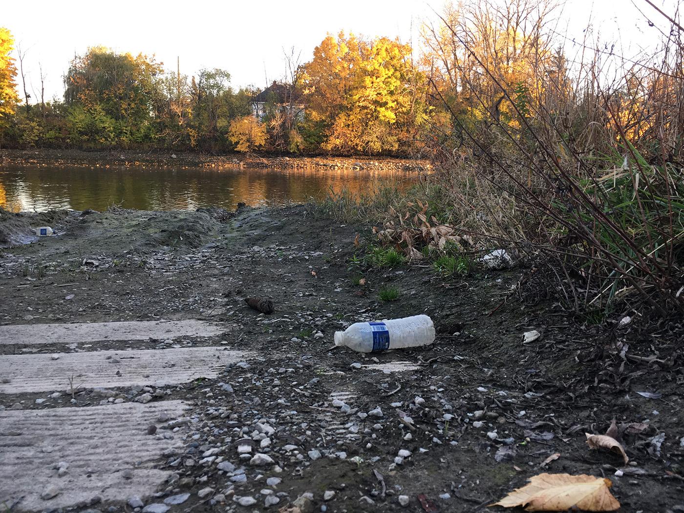 Water bottles littering the Flint River. Photo: Caitlin Saks/WGBH