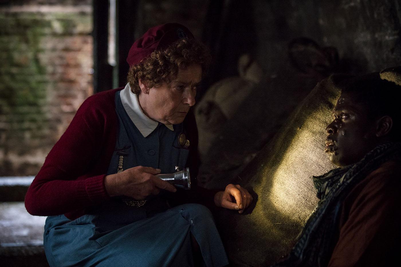 Nurse Crane and Ade Babayaro in Call the Midwife. Photo: Neal Street Productions