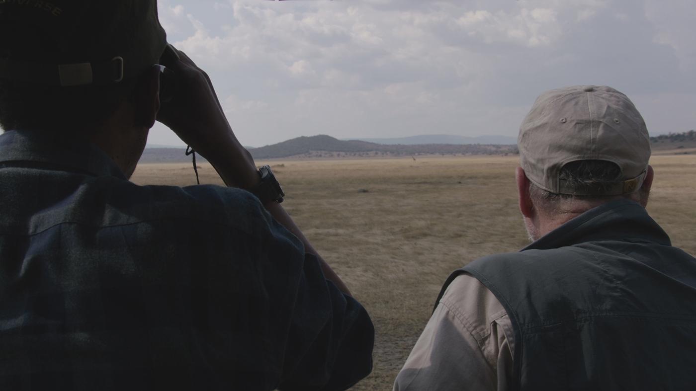 Peter Greenberg and Rwandan President Paul Kagame on safari in Akagera National Park