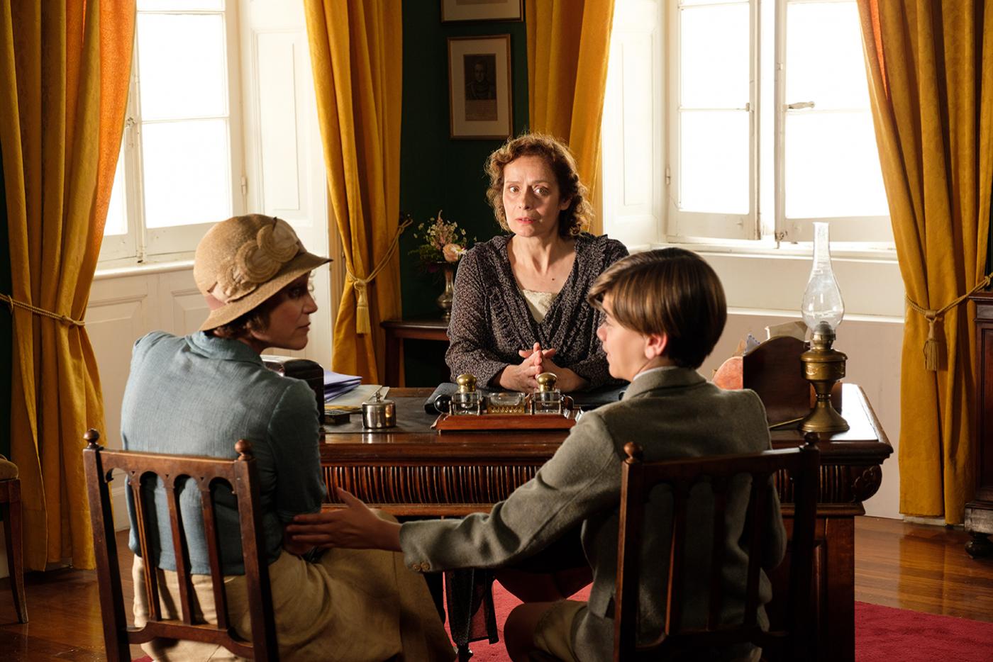 Louisa Durrell (KEELEY HAWES), Headmistress (NONI IOANNIDOU) & Gerald Durrell (MILO PARKER) in the Durrells in Corfu. Photo: Joss Barratt for Sid Gentle Films & MASTERPIECE