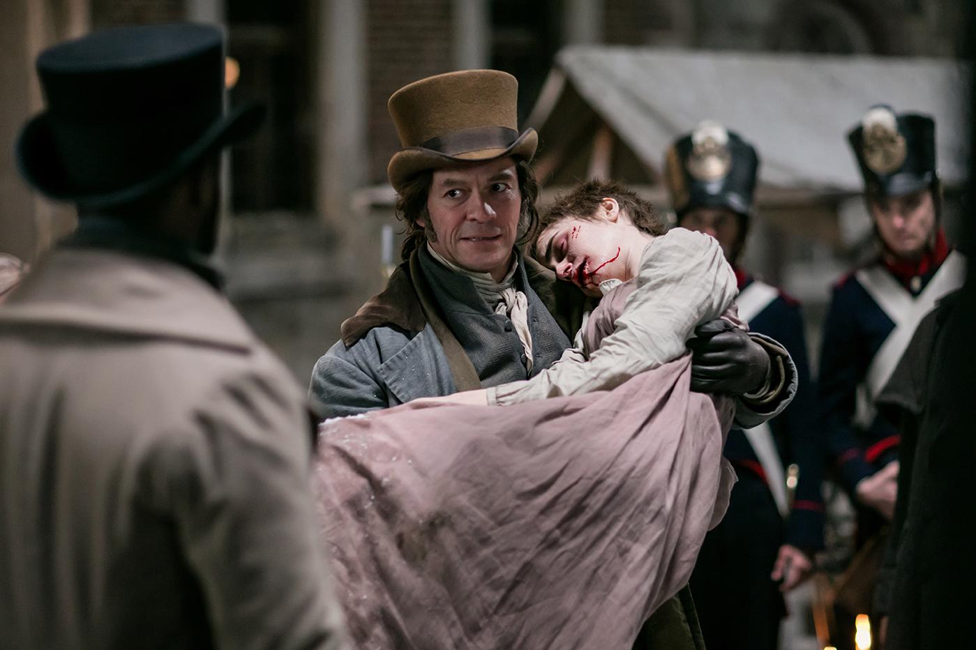 Javert (David Oyelowo), Jean Valjean (Dominic West), Fantine (Lily Collins) in Les Miserables. Photo: Robert Viglasky / Lookout Point