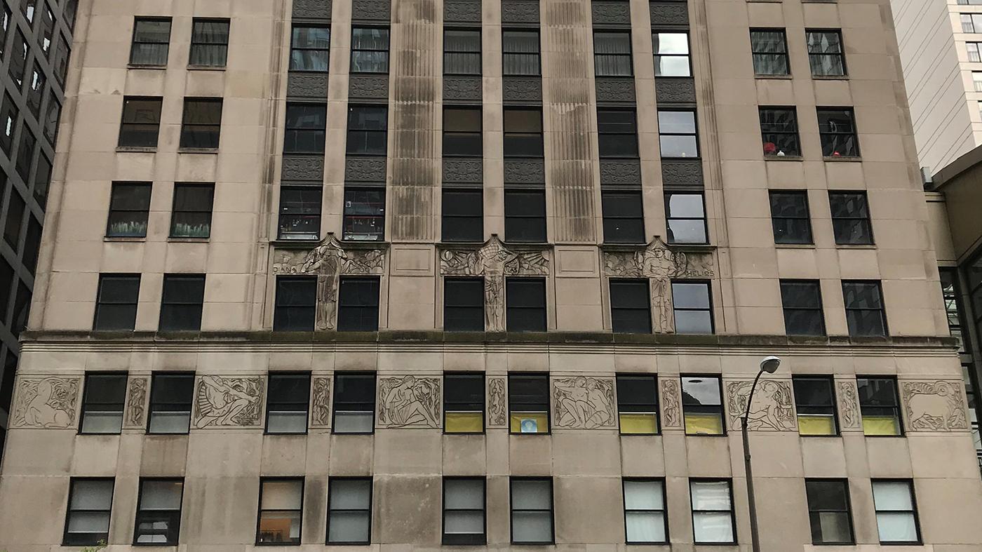 The facade of the McGraw-Hill Building features sculptural panels with Greek deities and the Zodiac, by the artists Gwen and Eugene Lux
