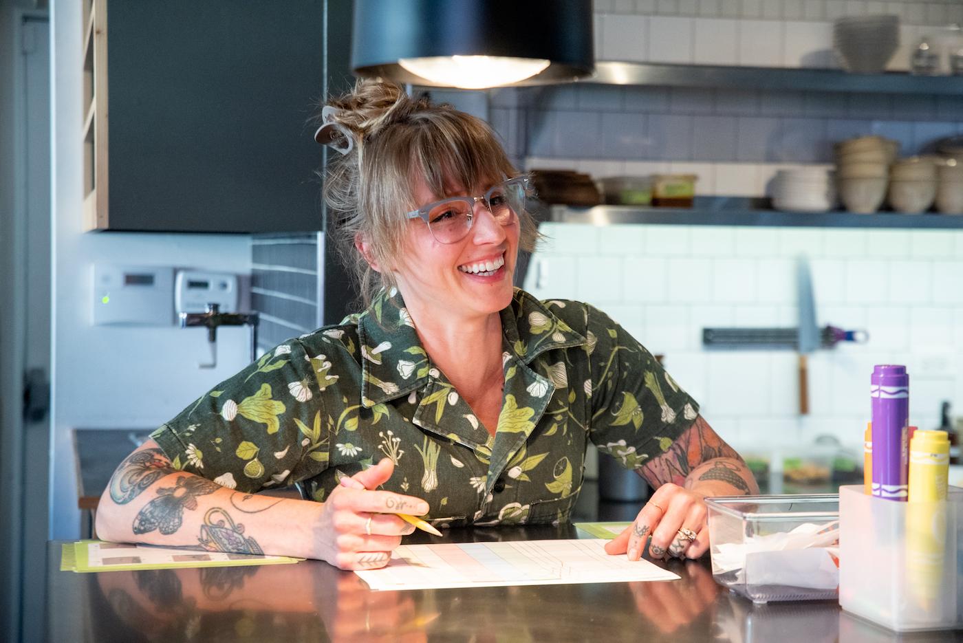 Chef Tayler Ploshehanski, 33, expedites food orders during the dinner service at Wherewithall at 3472 N. Elston Ave. in Chicago, Illinois. Photo: WTTW/Kathleen Hinkel