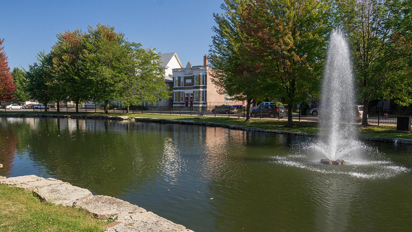 A fountain in Auburn Park's lagoon in Chicago