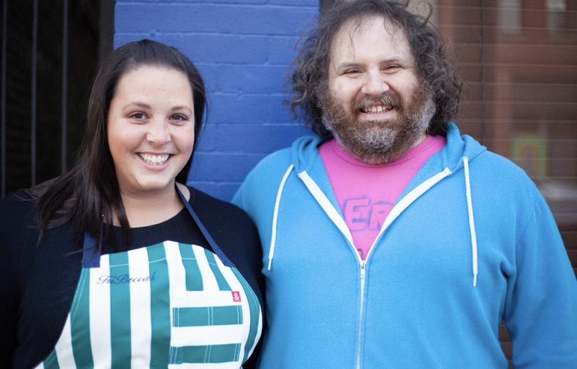 Becca Grothe and Cam Waron smile for a photo