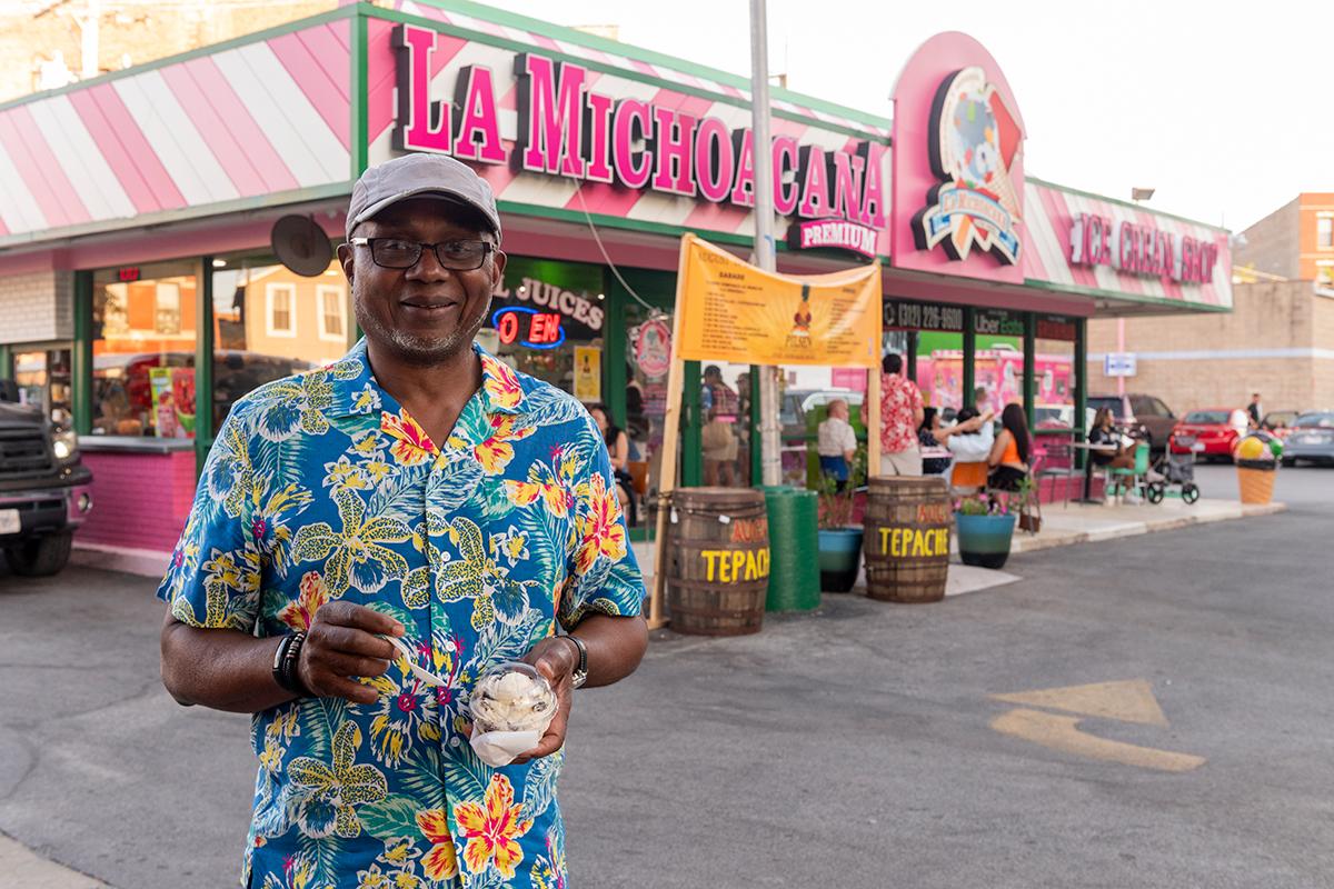 Ken C enjoys a scoop of ice cream