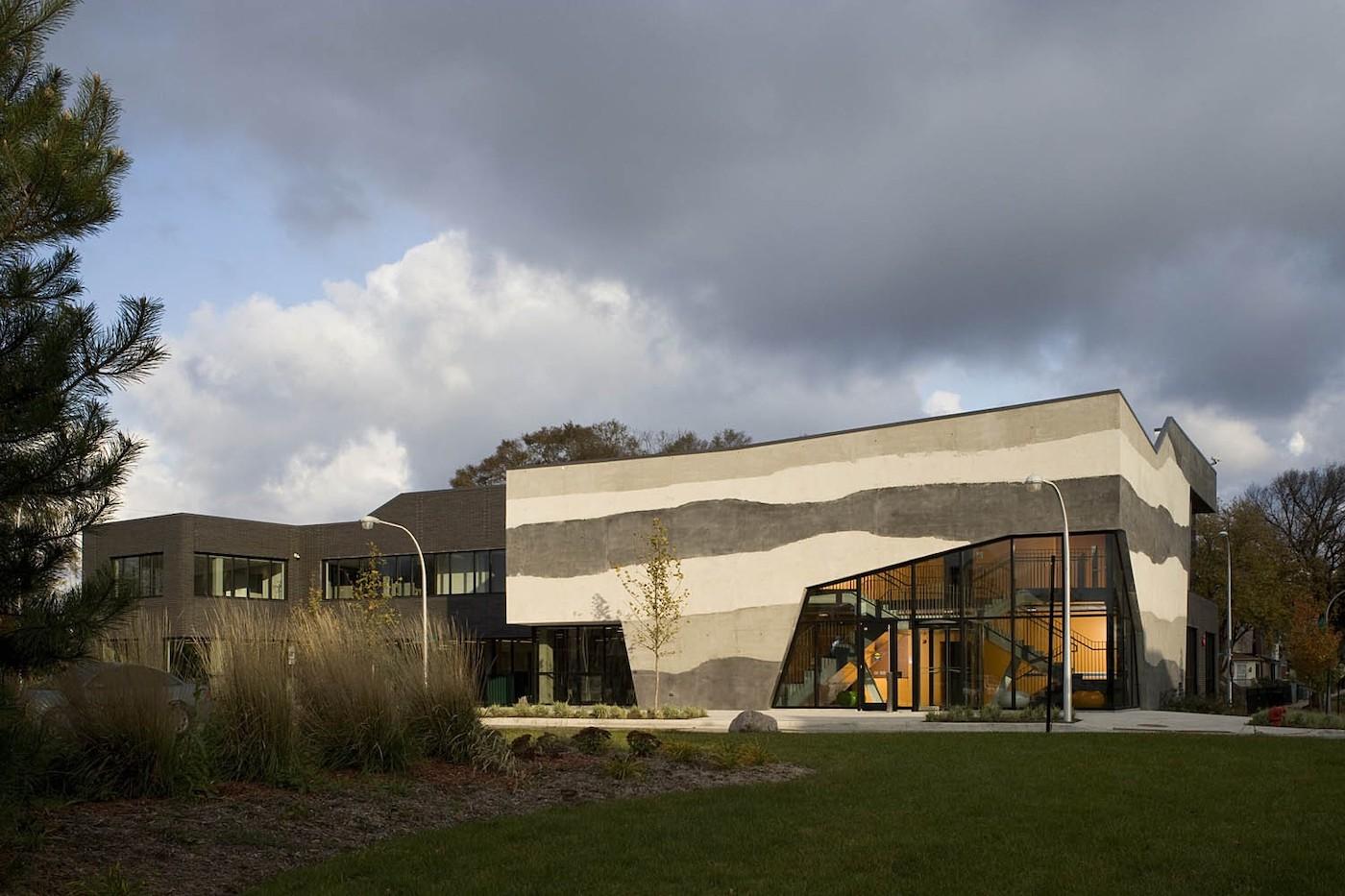 The SOS Children's Villages in front of a cloudy sky