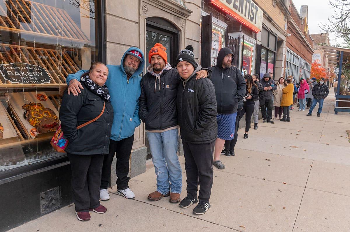 Maricela, Bernado, Jose, and Enrique stand in line at Pan Artesanal