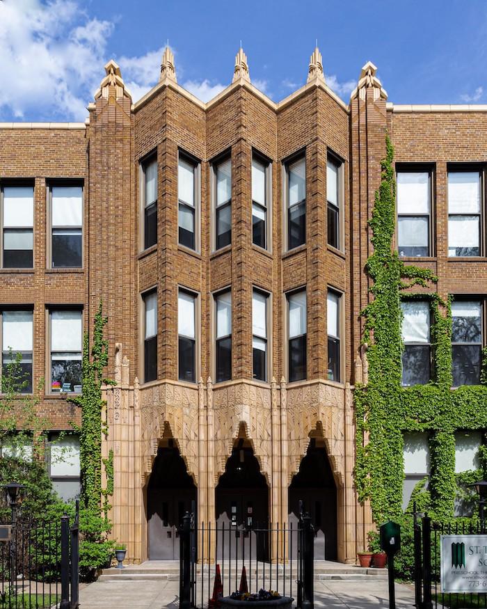 Pointed windows on the exterior of St. Thomas the Apostle Church in Chicago 