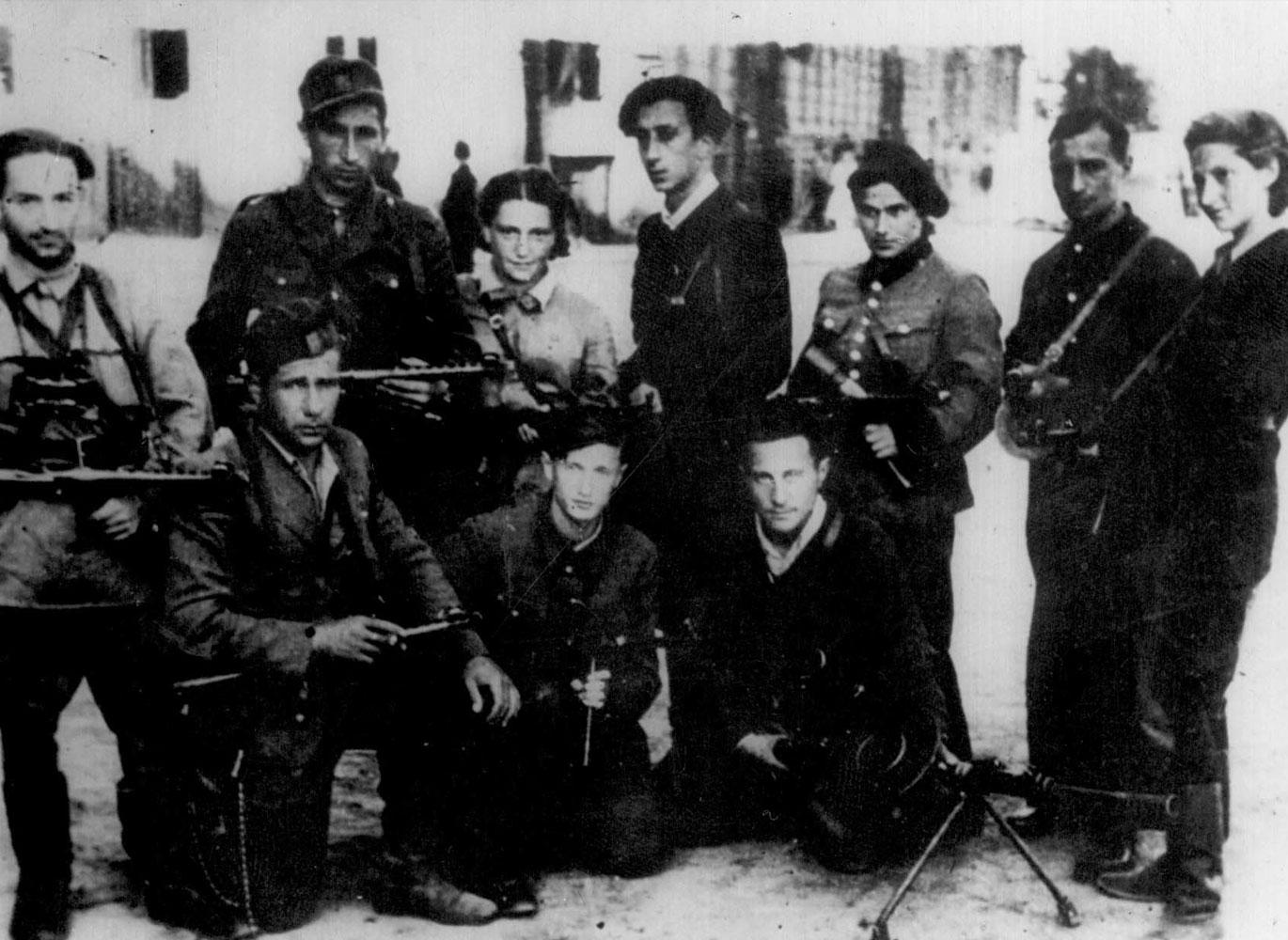 Abba Kovner with a group of Jewish Partisan resistance fighters Abba Kovner with a group of Jewish Partisan resistance fighters