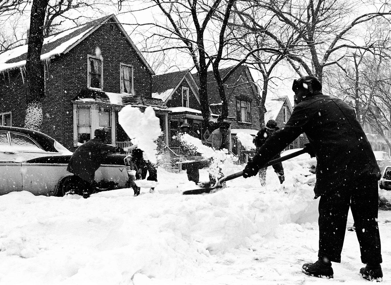 People shoveling snow.