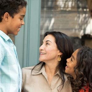 Mom talking to her two kids.