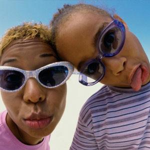 Mom and kid making silly faces.