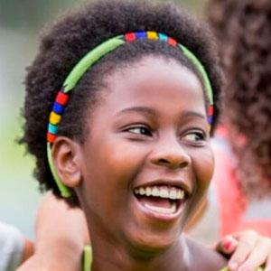 Girl laughing with friends.