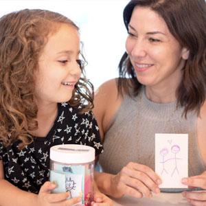 Girl and mom with their jars.