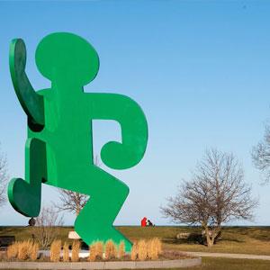 A Keith Haring sculpture is the centerpiece of AIDS Garden Chicago. Credit: Ken Carl for WTTW