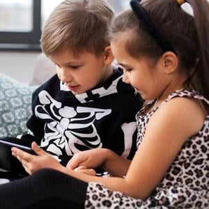 Children in costume playing games. Children in costume playing games.