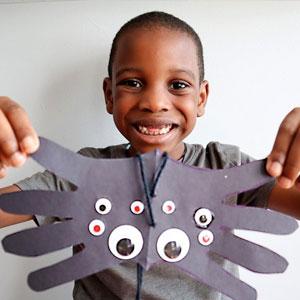Child with his homemade spider