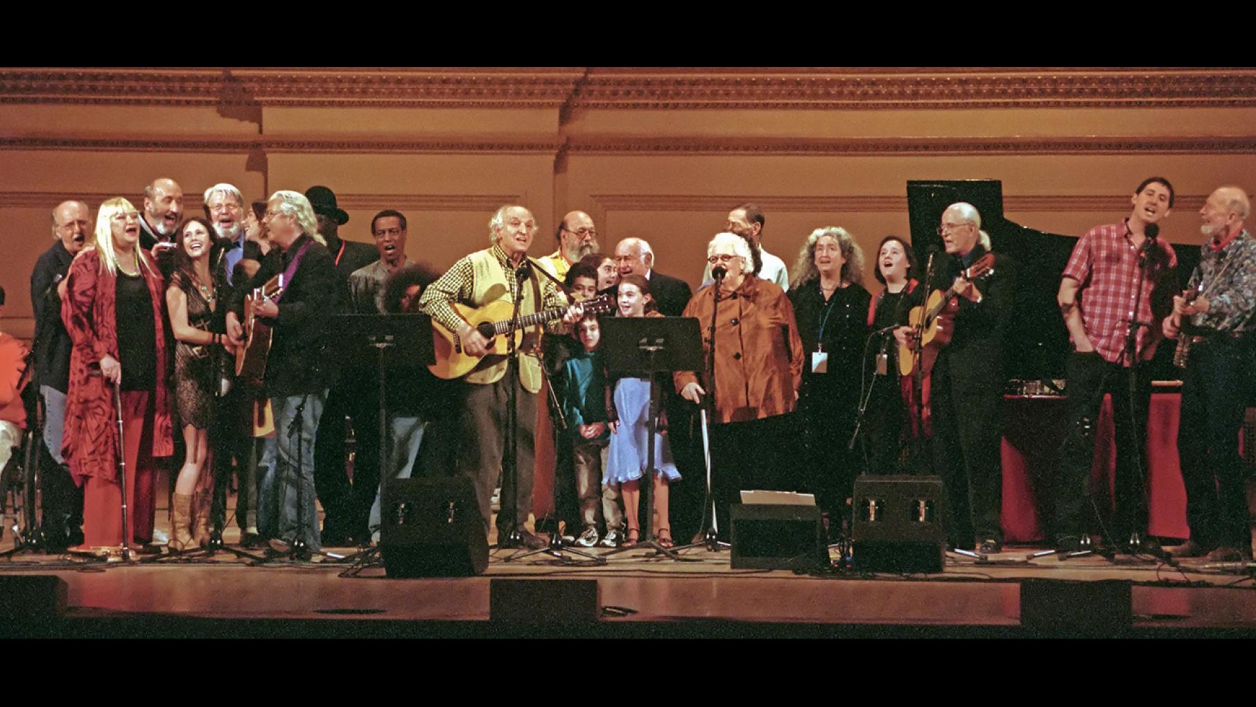 Pete Seeger & The Weavers, Peter, Paul & Mary, Arlo Guthrie and more on stage. Photo: Robert Corwin