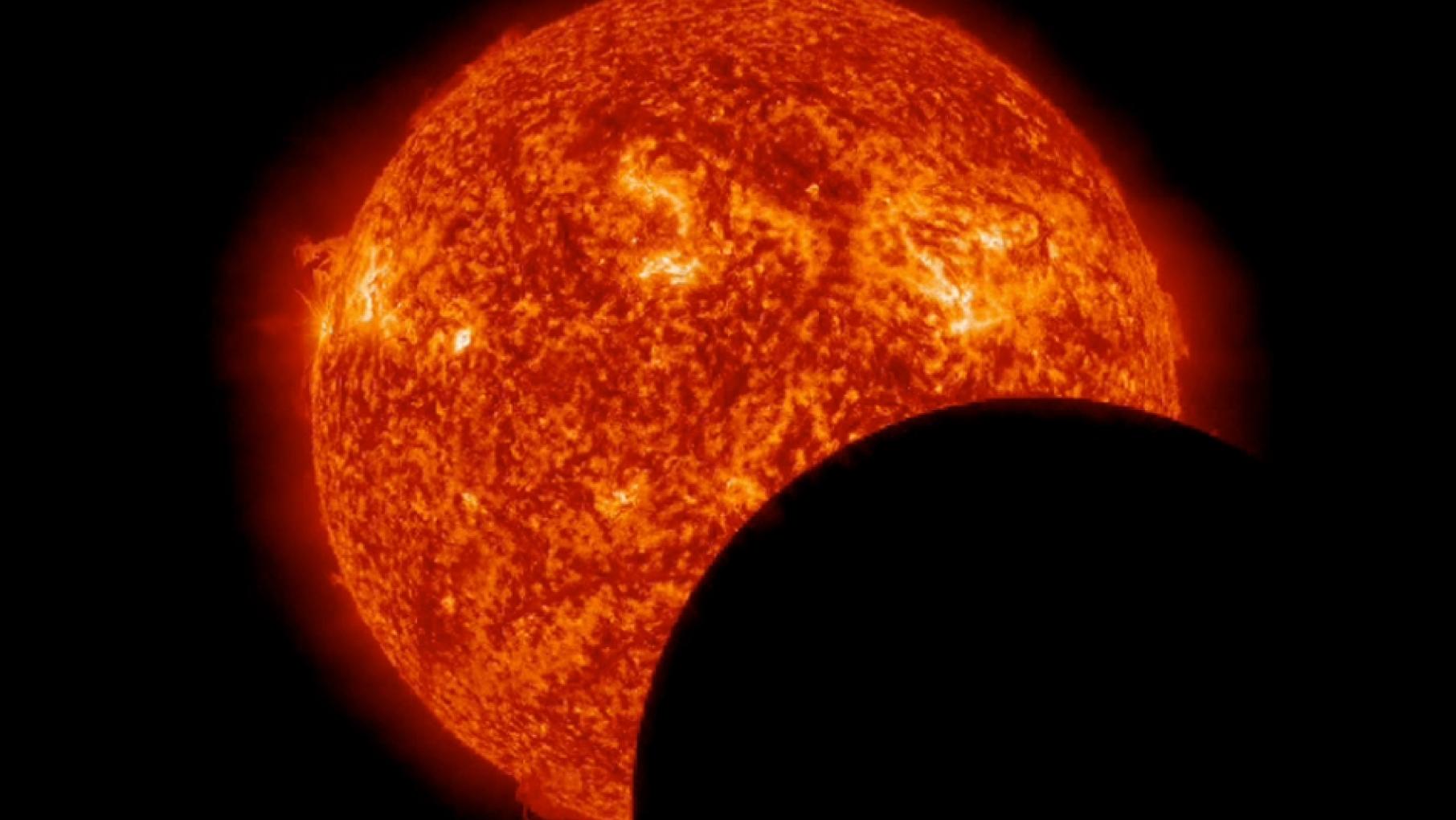 This image from NASA’s Solar Dynamics Observatory shows the moon crossing in front of the sun. Photo: NASA/SDO