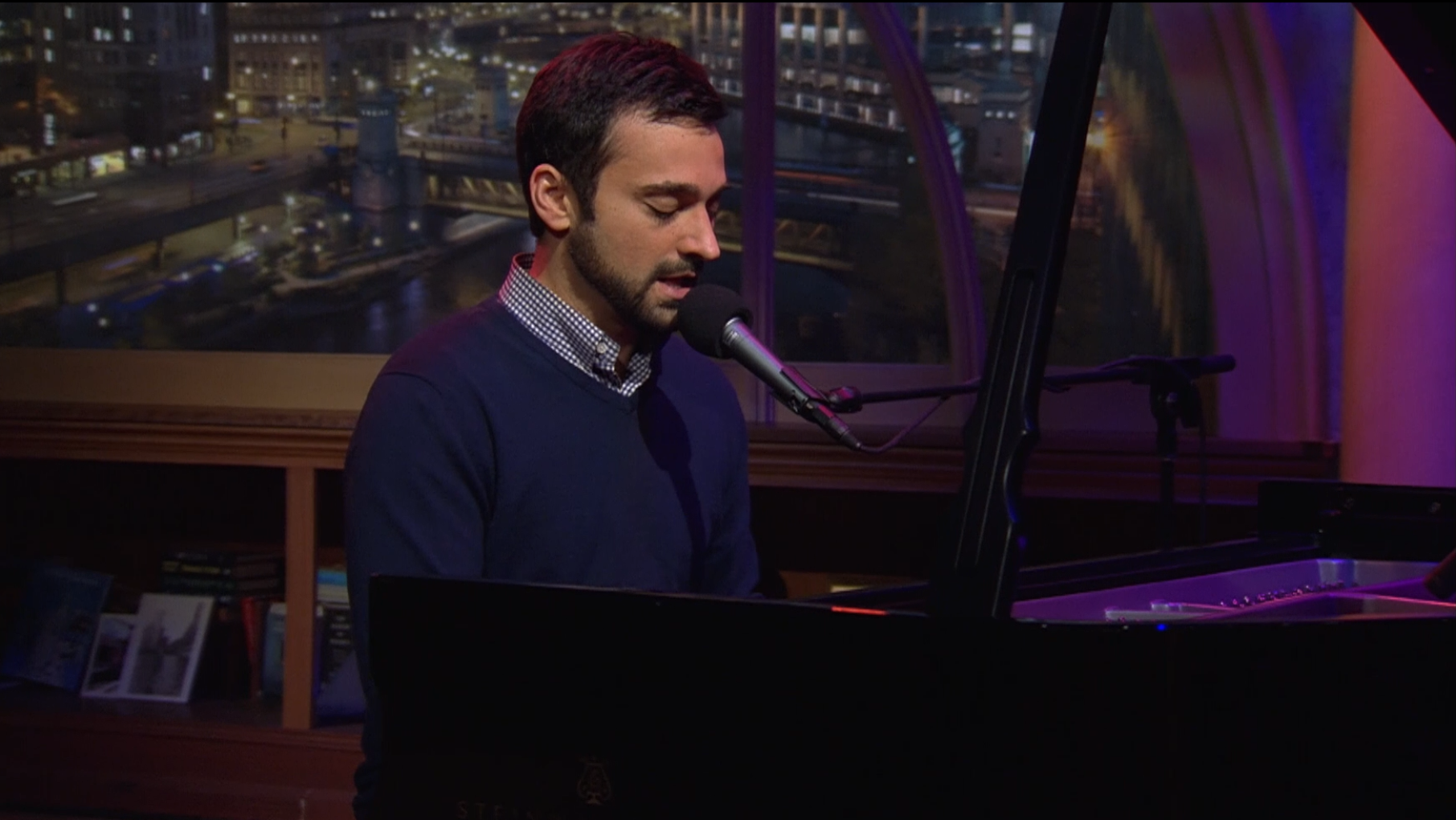 Chicago Tonight's Paris Schutz plays a Christmas song at the piano