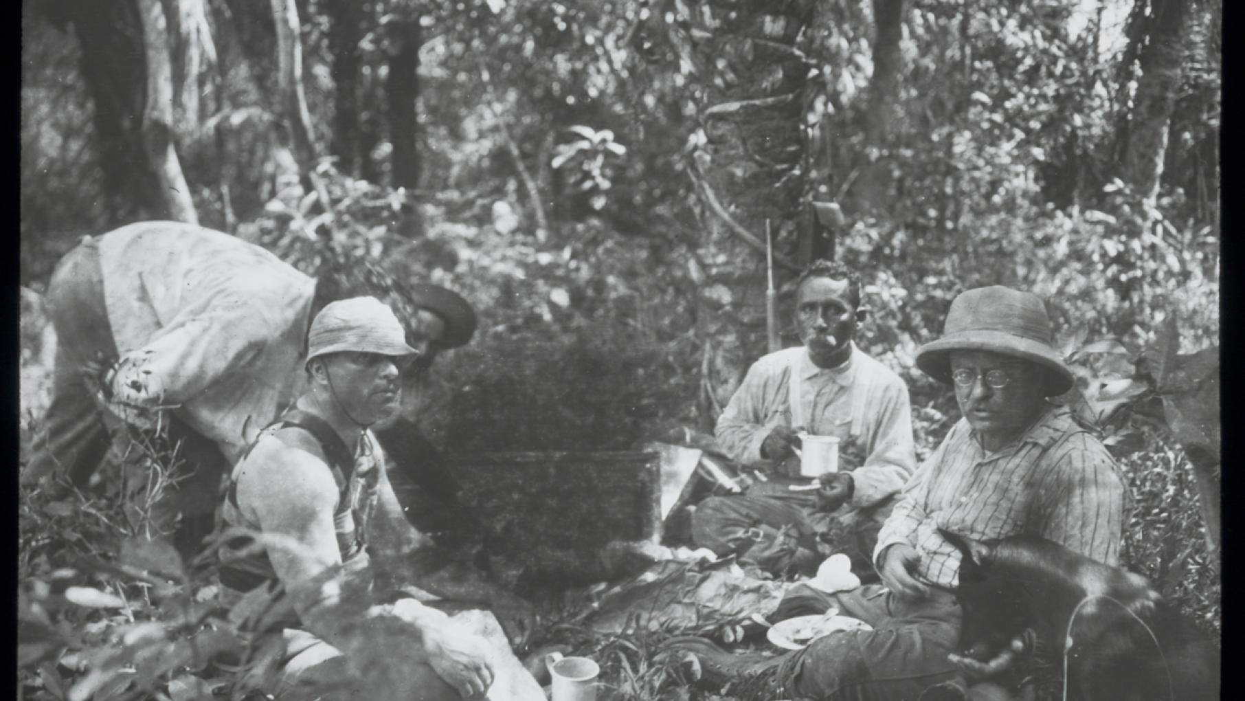 Theodore Roosevelt, Candido Rondon and camaradas sitting in camp, 1914. Photo: Courtesy of the Library of Congress